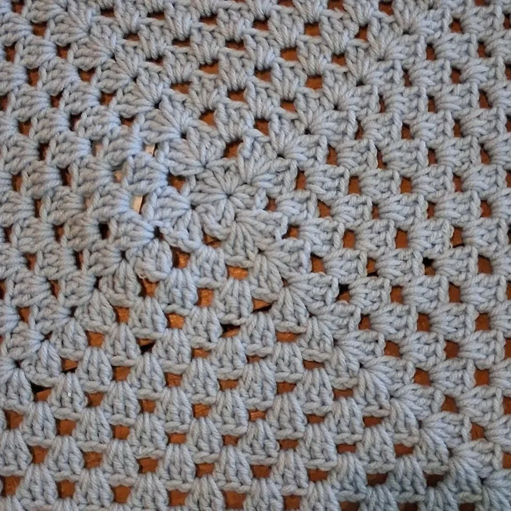 Vintage Hand made  crocheted  blue with‎ pink trim blanket
